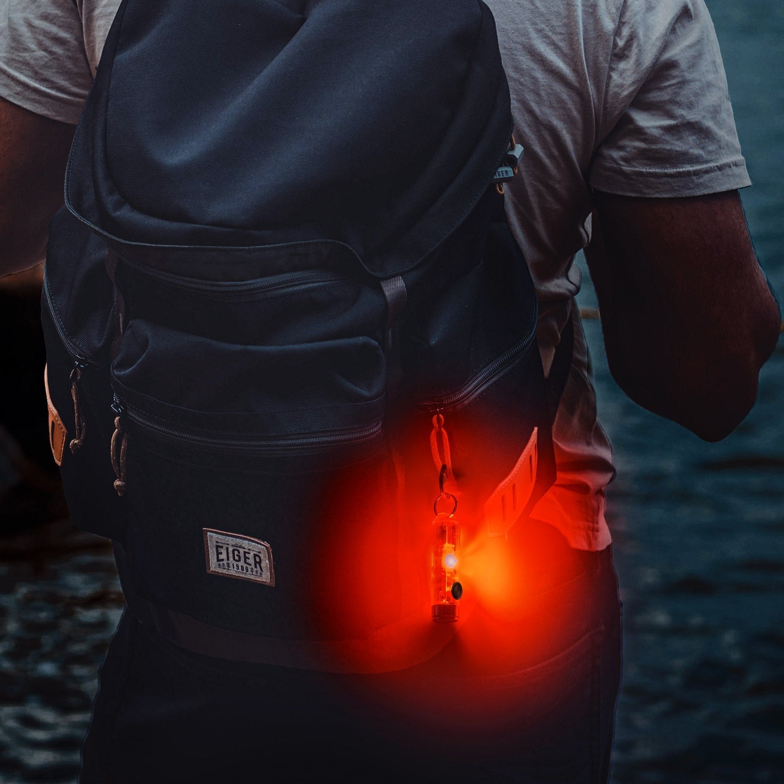 Image of RovyVon Aurora A8 G4 red sidelight used as a visibility light on a backpack