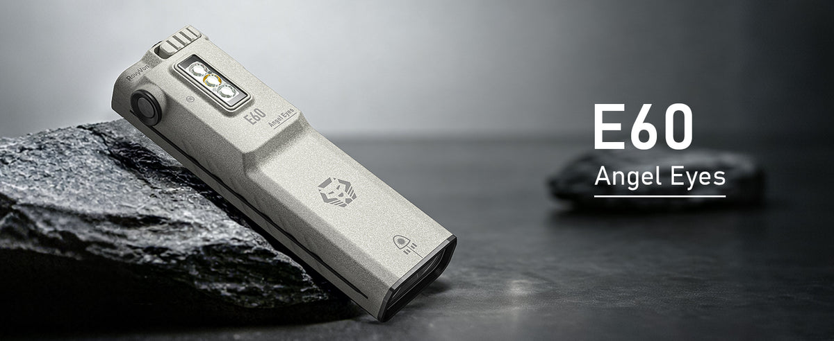 E60 Angel Eyes compact flashlight resting on stone, product overview banner