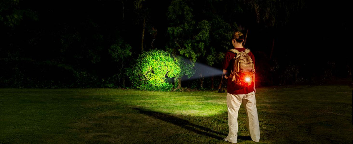 E60 front white light illuminates an outdoor night scene